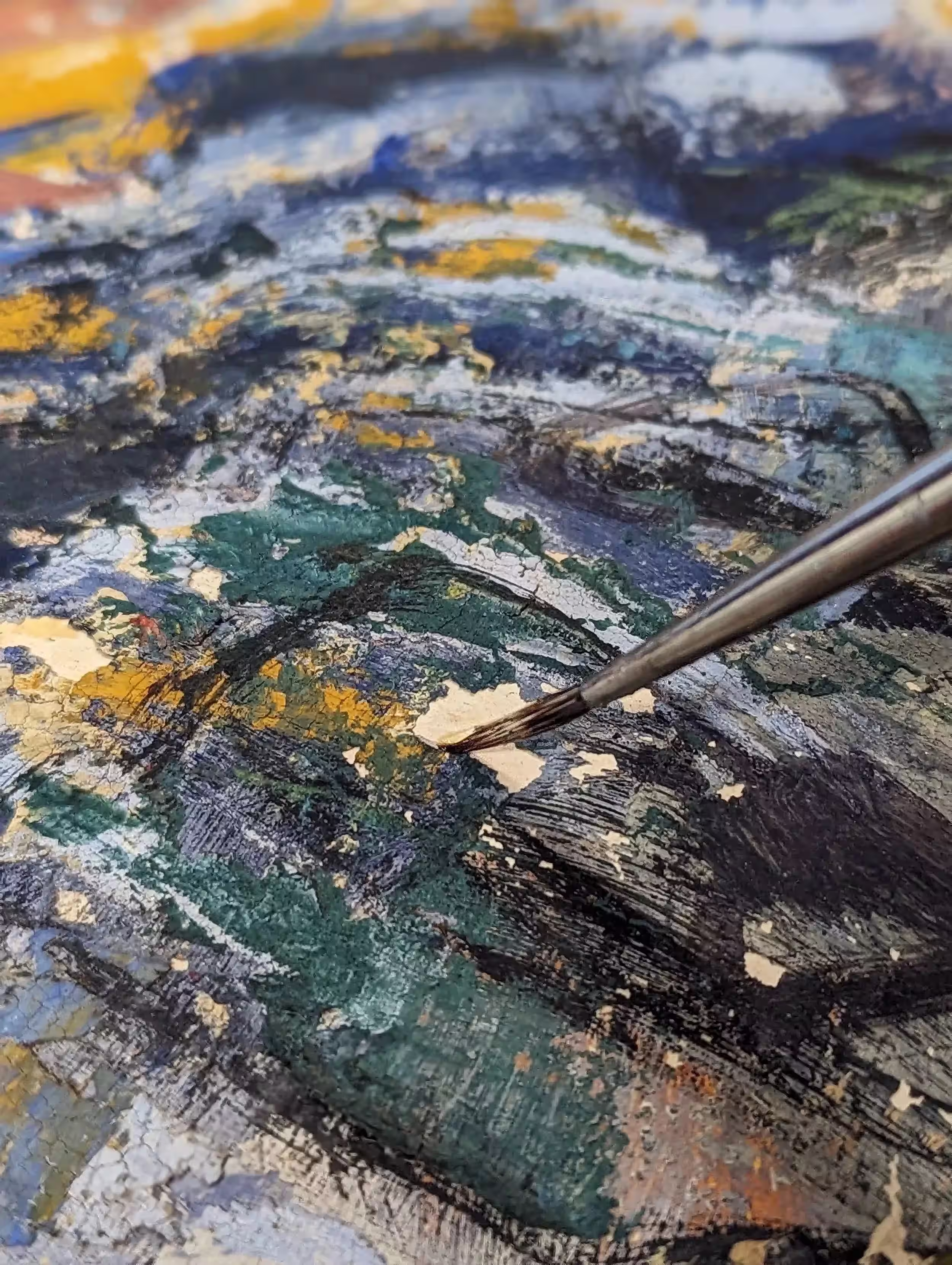 Closeup of brush on painting